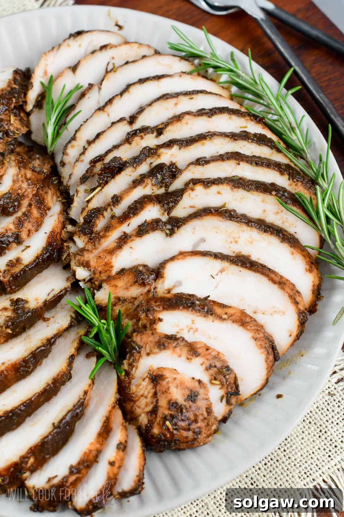 tender and flavorful turkey tenderloin sliced and layered on the platter with balsamic and Italian seasoning coating.