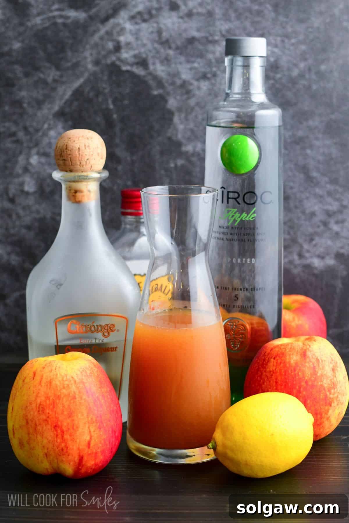 Autumn Orchard Martini 3 Array of fresh ingredients laid out on a wooden surface for crafting an autumn-inspired Apple Cider Martini.