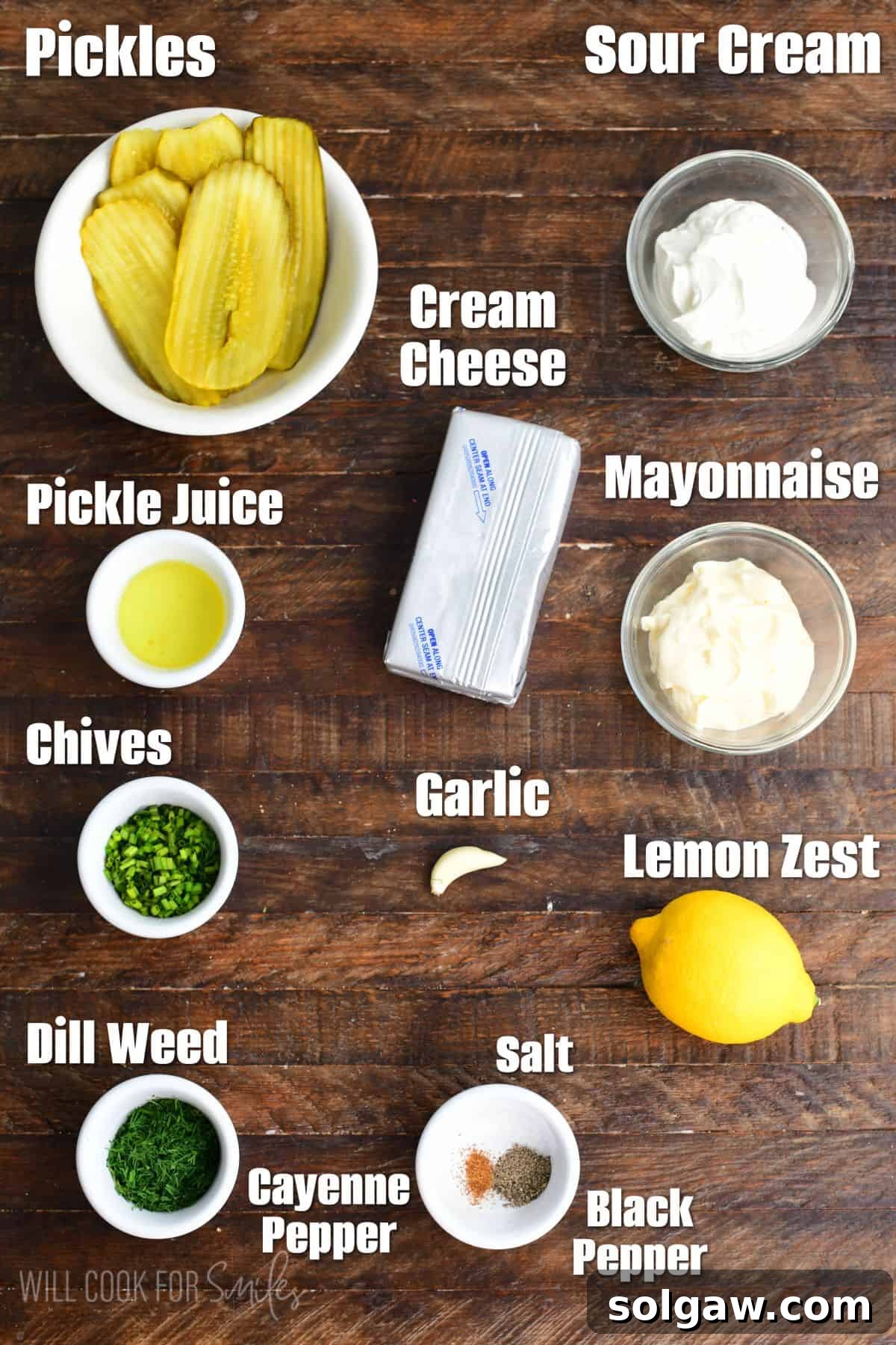 Labeled pickle dip ingredients on a wood surface.