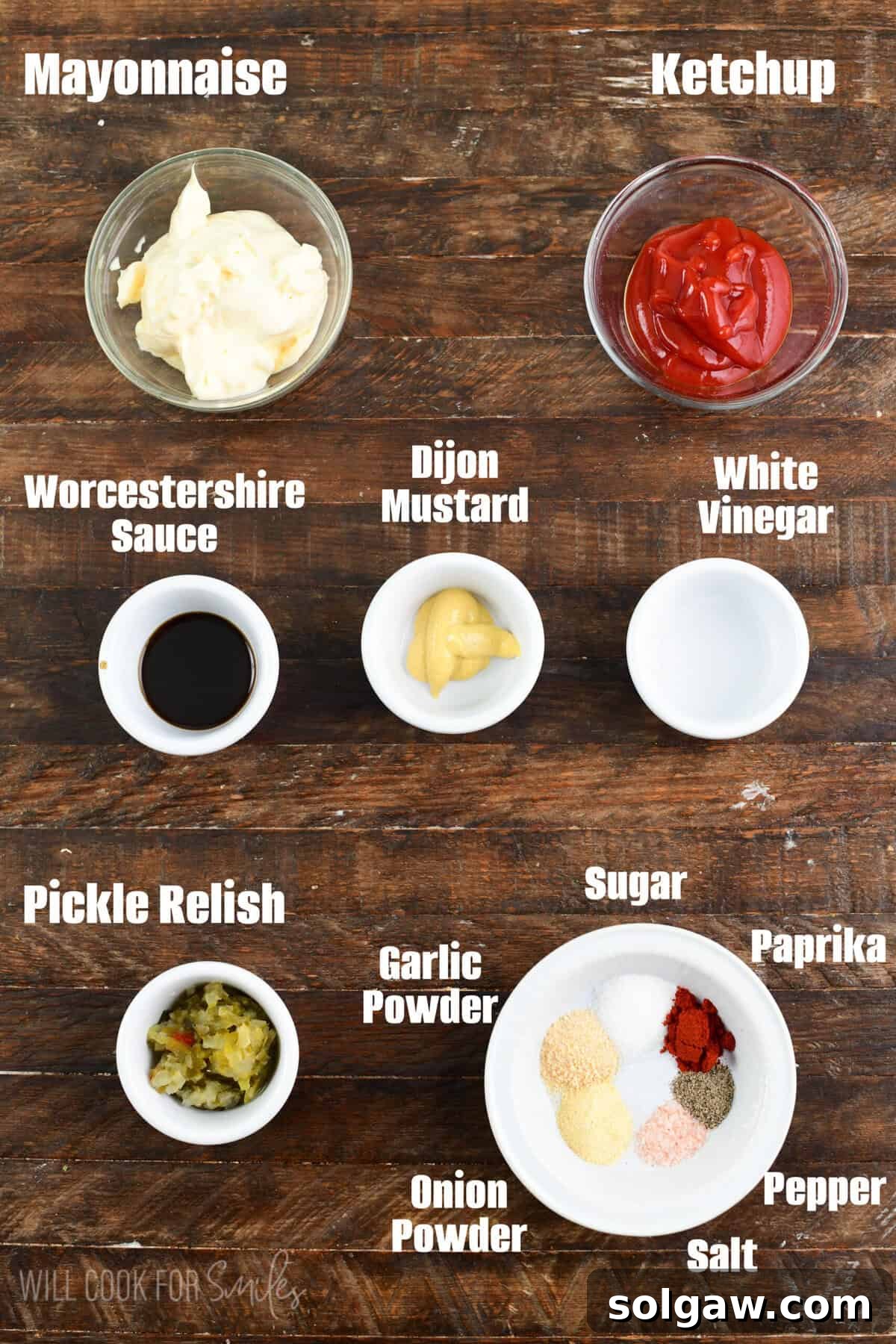 labeled ingredients for burger sauce on a wood surface.