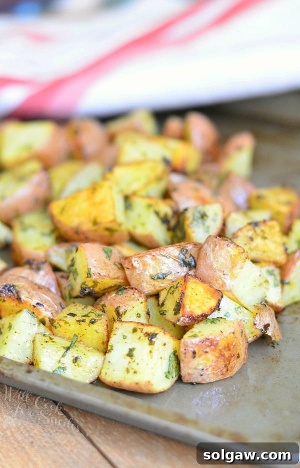 Cilantro Lime Roasted Potatoes served on a white plate