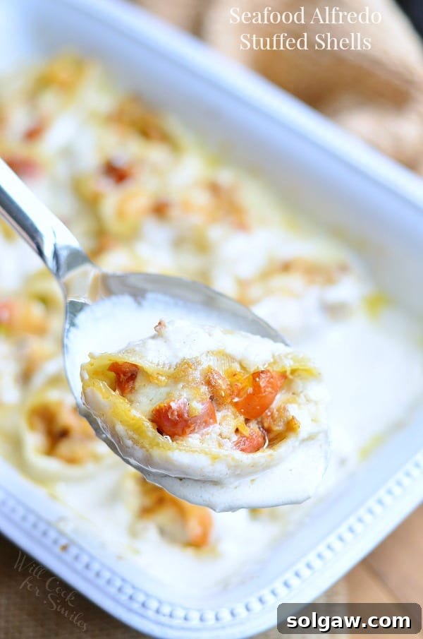 Creamy Seafood Alfredo Stuffed Shells, a luxurious pasta dish filled with rich seafood and cheese.