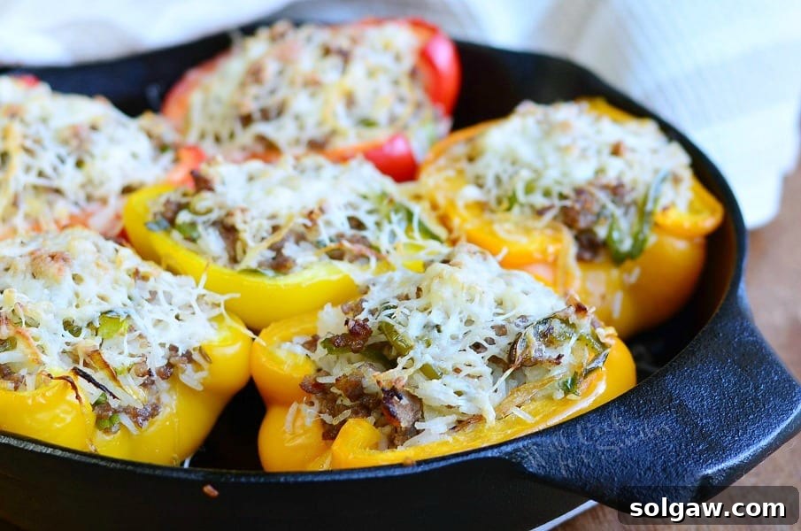 Close-up of baked Italian Sausage Stuffed Peppers with melted cheese