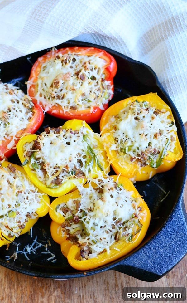 A tray of beautifully baked Sausage & Onion Stuffed Peppers