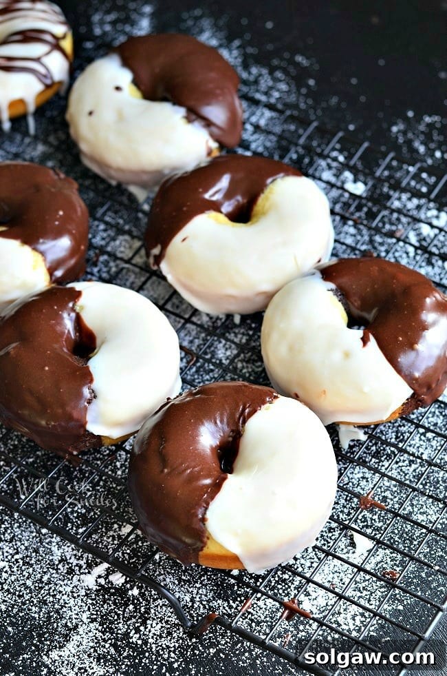 Stack of Black and White Glazed Donuts, showcasing their elegant presentation