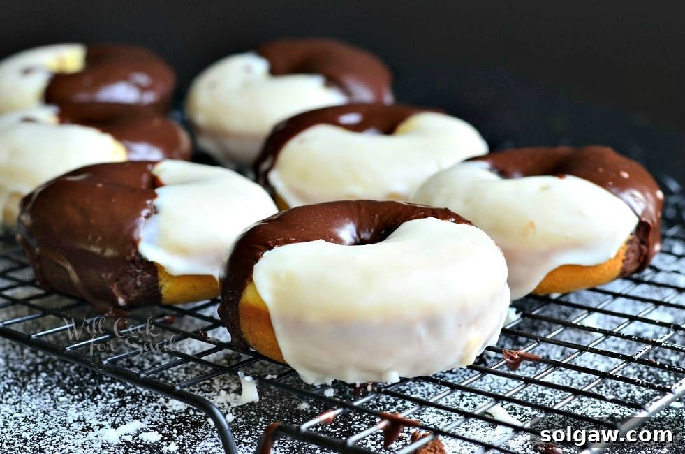 Close-up of a Black and White Glazed Donut, showing the distinct chocolate and vanilla halves